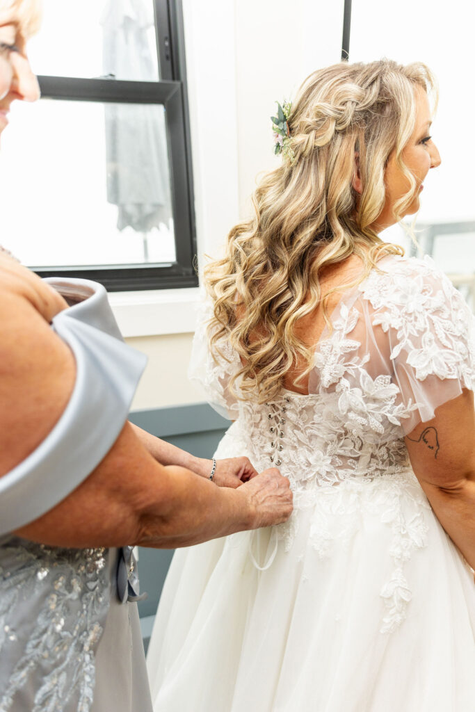 bride getting ready for wedding at the ironspire complex in adamstown pa